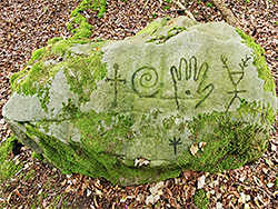 Effigies on a boulder